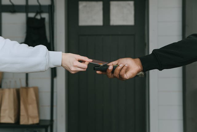 person using a debit card