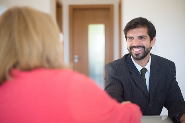 landlord shaking hands with potential tenant