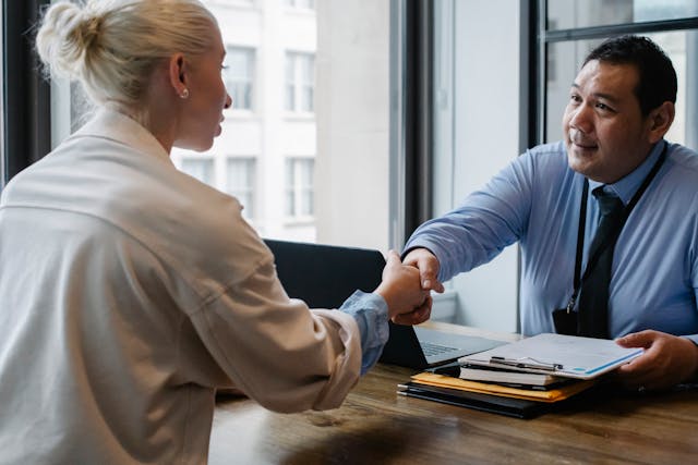 A Landlord shaking hands with potential landlord